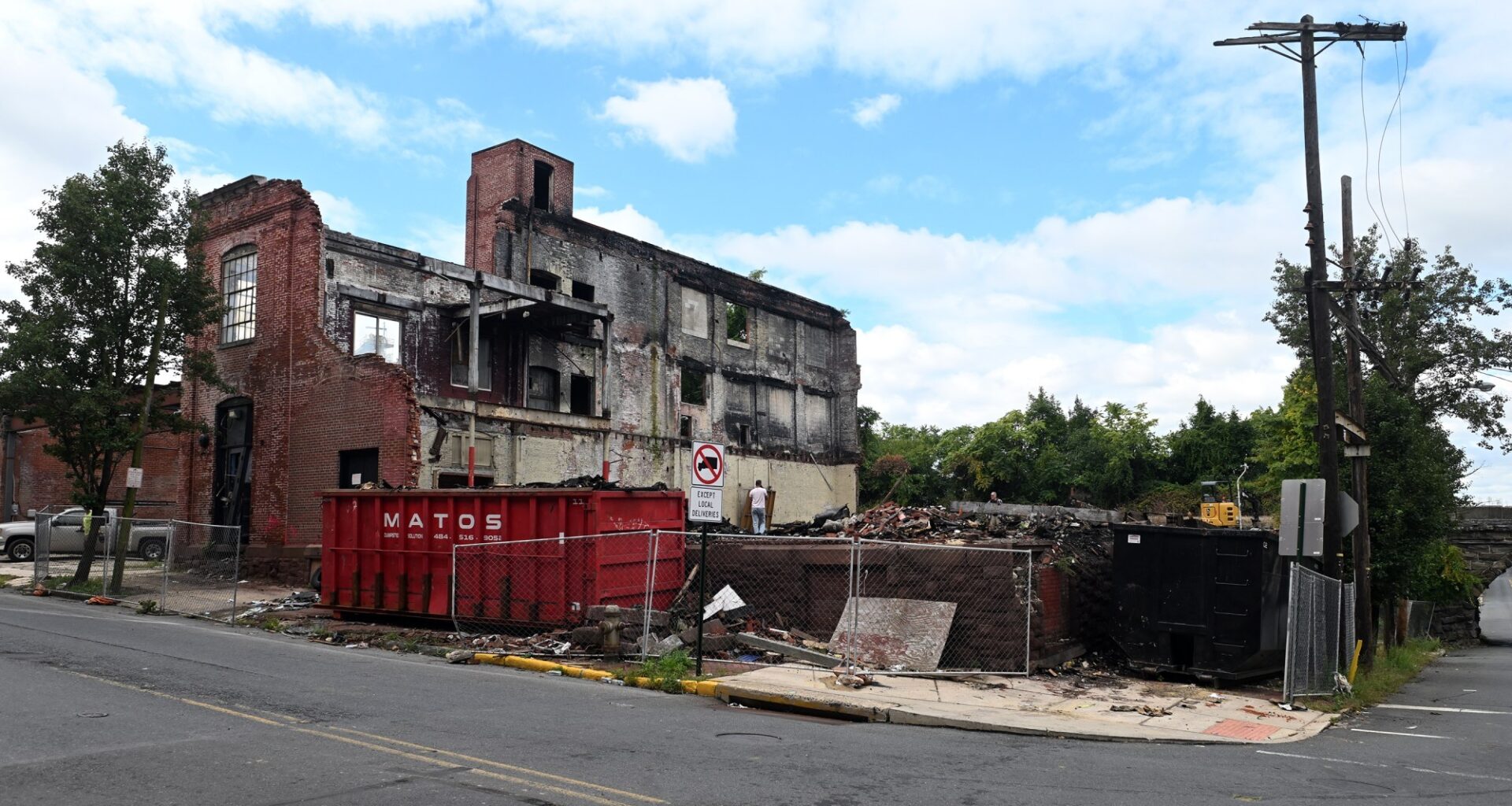 Demolition underway at fire-damaged warehouse in Reading