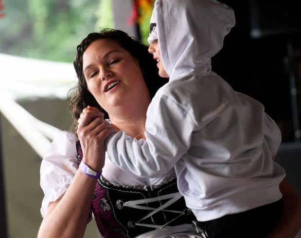 Kate Campbell of Reading dances a polka with her son Clayton, 5, at Oktoberfest at the Liederkranz in Lower Alsace Township on Oct. 1, 2022. (BILL UHRICH/READING EAGLE)