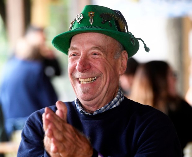 Lloyd "Rolfe" Hoganmuller of Quakertown is ready to dig into Oktoberfest at the Liederkranz in Lower Alsace Township on Oct. 1, 2022. He was attending with longtime friend Billie "Gretchen" Stern, also of Quakertown. (BILL UHRICH/READING EAGLE)