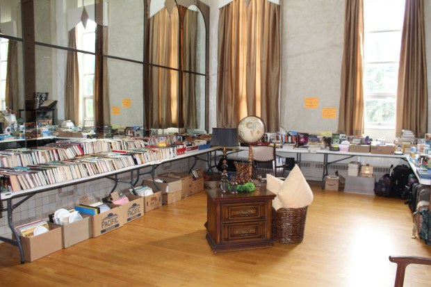Books and furniture items available for sale at St. John's Russian Orthodox Cathedral annual flea market at the church center in Mayfield. (Danielle Karwaski/For The Valley Advantage)