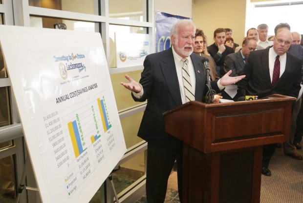 Bob Bolus confronts Lackawanna County Commissioners about using the former Globe Store as a County Building during a special meeting inside the former Globe Store. Jake Danna Stevens / Staff Photographer