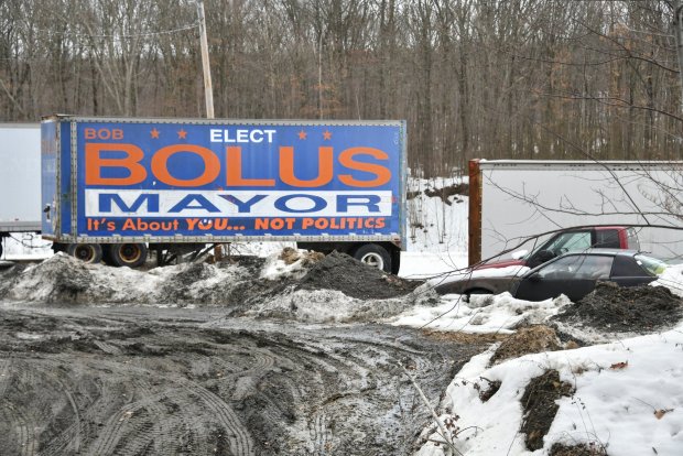 Bob Bolus has a bunch of tractor trailer bodies in varying conditions, along with undriveable cars on his property in Jessup. Borough officials believe he's violating the town's zoning by illegally operating a junkyard.