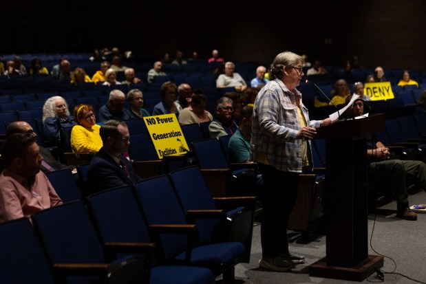 Archbald resident Karen Timmons questions Essential Energy officials during a conditional hearing on Monday, June 22, 2026, at the Valley View High School in Archbald. (FRANK WILKES LESNEFSKY / STAFF PHOTO)