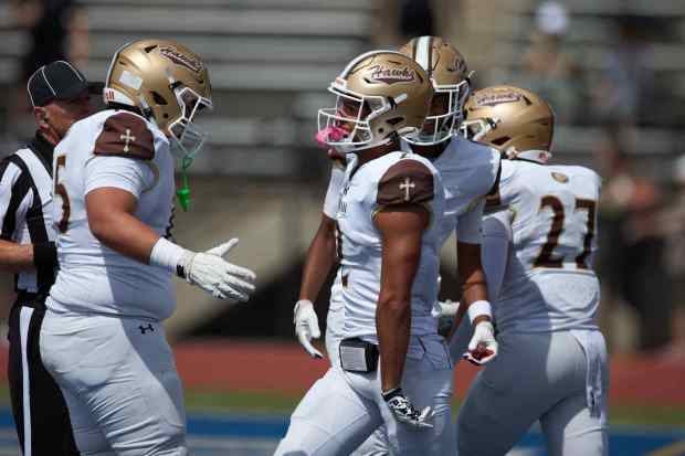 Bethlehem Catholic's Carter Vassa and Aiden Rivera celebrate a touchdown against Allentown Central Catholic on Saturday, Sept. 5, 2026, at J. Birney Crum Stadium in Allentown. (David Garrett/Special to The Morning Call)