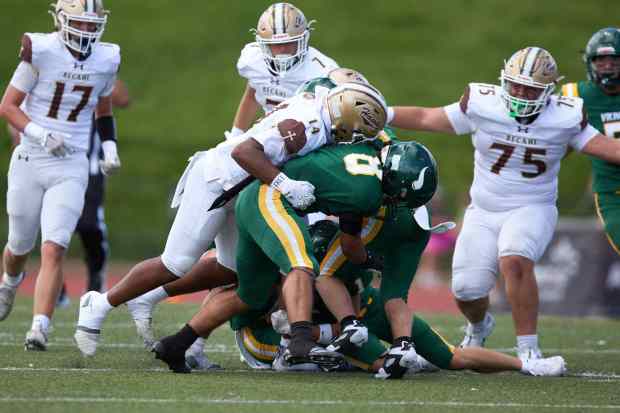 Allentown Central Catholic's Trey Torres-Johnsonis tackles Bethlehem Catholic's Zakai Brake on Saturday, Sept. 5, 2026, at J. Birney Crum Stadium in Allentown. (David Garrett/Special to The Morning Call)