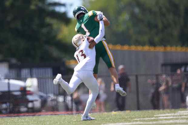 Allentown Central Catholic's Grayson Schmell  is tackled by Bethlehem Catholic's Tyre Lewis on Saturday, Sept. 5, 2026, at J. Birney Crum Stadium in Allentown. (David Garrett/Special to The Morning Call)