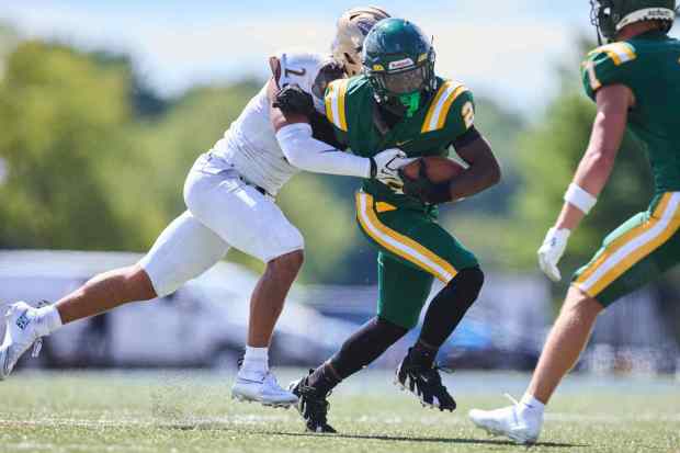 Allentown Central Catholic's Tahir Edmondson is tackled by Bethlehem Catholic's Carter Vassa on Saturday, Sept. 5, 2026, at J. Birney Crum Stadium. (David Garrett/Special to The Morning Call)