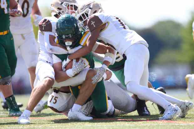 Allentown Central Catholic's Tahir Edmondson is tackled by Bethlehem Catholic's Carter Vassa on Saturday, Sept. 5, 2026, at J. Birney Crum Stadium. (David Garrett/Special to The Morning Call)