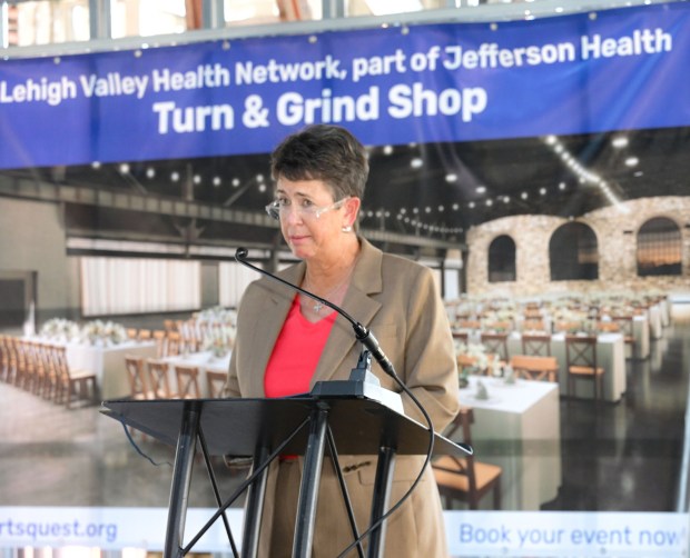 ArtsQuest president and CEO Kassie Hilgert addresses attendees during a beam-signing ceremony Friday, Sept. 18, 2026, at the new Jefferson Health Turn & Grind Shop at SteelStacks in Bethlehem. ArtsQuest leadership, elected officials, Lehigh Valley Health Network/Jefferson Health representatives, project partners and community leaders signed a steel beam that will become part of the revitalized building. (Monica Cabrera/The Morning Call)