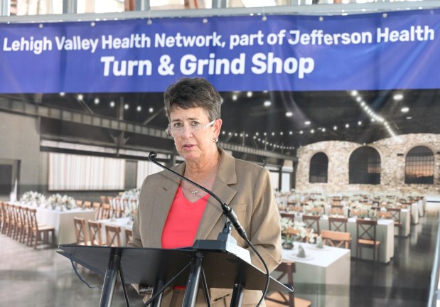 ArtsQuest president and CEO Kassie Hilgert addresses attendees during a beam-signing ceremony Friday, Sept. 18, 2026, at the new Jefferson Health Turn & Grind Shop at SteelStacks in Bethlehem. ArtsQuest leadership, elected officials, Lehigh Valley Health Network/Jefferson Health representatives, project partners and community leaders signed a steel beam that will become part of the revitalized building. (Monica Cabrera/The Morning Call)