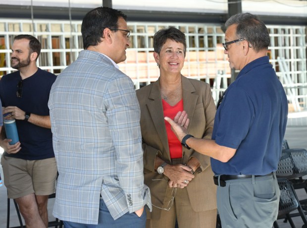 ArtsQuest president and CEO Kassie Hilgert mingles with attendees Friday, Sept. 18, 2026, during a beam-signing ceremony at the new Jefferson Health Turn & Grind Shop at SteelStacks in Bethlehem. ArtsQuest leadership, elected officials, Lehigh Valley Health Network/Jefferson Health representatives, project partners and community leaders signed a steel beam that will become part of the revitalized building. (Monica Cabrera/The Morning Call)