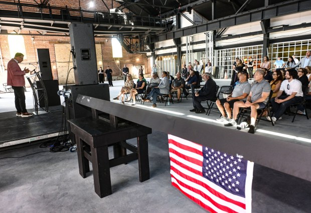 ArtsQuest Chief Operating Officer, Curt Mosel, addresses attendees Friday, Sept. 18, 2026, during a beam-signing ceremony at the new Jefferson Health Turn & Grind Shop at SteelStacks in Bethlehem. ArtsQuest leadership, elected officials, Lehigh Valley Health Network/Jefferson Health representatives, project partners and community leaders signed a steel beam that will become part of the revitalized building. (Monica Cabrera/The Morning Call)