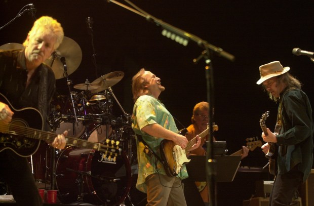 From left, Graham Nash, Stephen Stills and Neil Young of Crosby, Stills, Nash, and Young, perform at a concert at Madison Square Garden. (James Kelvom)