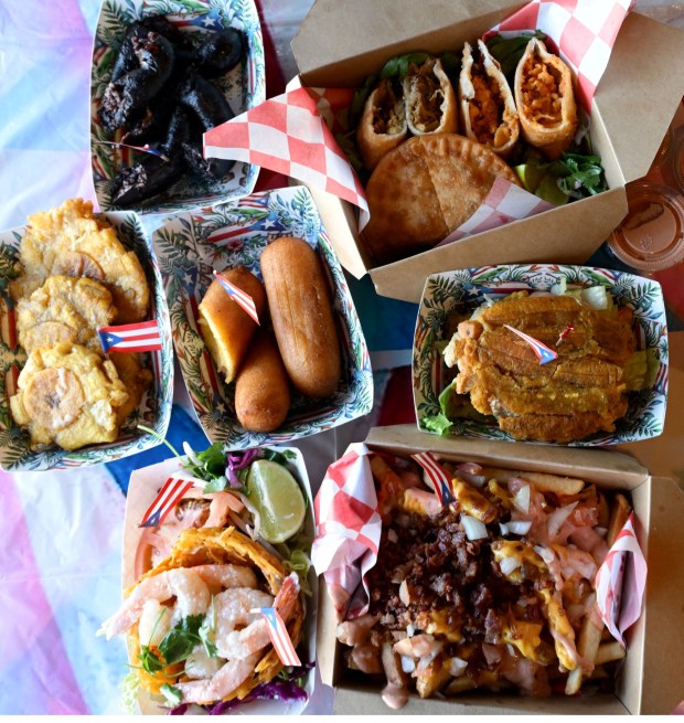Puerto Rican specialties are served Thursday, Sept. 24, 2026, at Chinchorro restaurant in Easton. Like their sister food truck La Frikitona, Chinchorro serves food items such as tostones, mofongo, sancocho, canoas and pastelillos. (Monica Cabrera/The Morning Call)