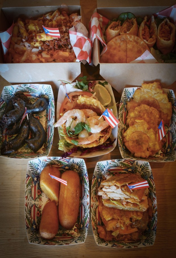 Puerto Rican specialties are served Thursday, Sept. 24, 2026, at Chinchorro restaurant in Easton. Like their sister food truck La Frikitona, Chinchorro serves food items such as tostones, mofongo, sancocho, canoas and pastelillos. (Monica Cabrera/The Morning Call)