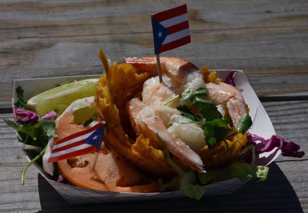 Shrimp DemBowl is one of the Puerto Rican specialties served Thursday, Sept. 24, 2026, at Chinchorro restaurant in Easton. Like their sister food truck La Frikitona, Chinchorro serves food items such as tostones, mofongo, sancocho, canoas and pastelillos. (Monica Cabrera/The Morning Call)