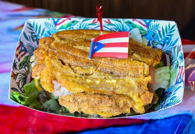 A Jibarito sandwich is among the Puerto Rican specialties served Thursday, Sept. 24, 2026, at Chinchorro restaurant in Easton. Like their sister food truck La Frikitona, Chinchorro serves food items such as tostones, mofongo, sancocho, canoas and pastelillos. (Monica Cabrera/The Morning Call)