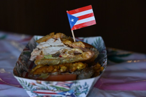 A Jibarito sandwich is among the Puerto Rican specialties served Thursday, Sept. 24, 2026, at Chinchorro restaurant in Easton. Like their sister food truck La Frikitona, Chinchorro serves food items such as tostones, mofongo, sancocho, canoas and pastelillos. (Monica Cabrera/The Morning Call)
