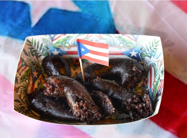 Black sausage is among the Puerto Rican specialties served Thursday, Sept. 24, 2026, at Chinchorro restaurant in Easton. Like their sister food truck La Frikitona, Chinchorro serves food items such as tostones, mofongo, sancocho, canoas and pastelillos. (Monica Cabrera/The Morning Call)