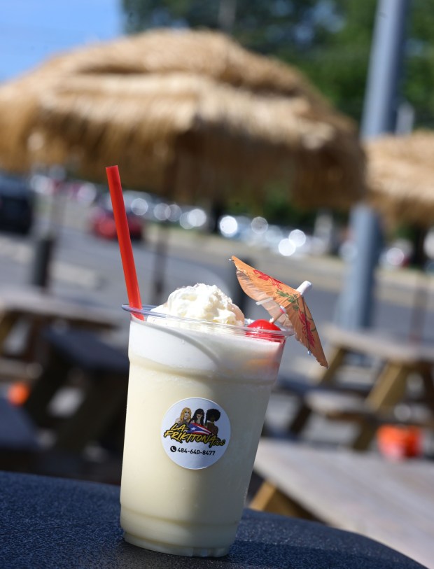 A Piña Colada Mocktail is served Thursday, Sept. 24, 2026, at Chinchorro restaurant in Easton. Like their sister food truck La Frikitona, Chinchorro serves food items such as tostones, mofongo, sancocho, canoas and pastelillos. (Monica Cabrera/The Morning Call)