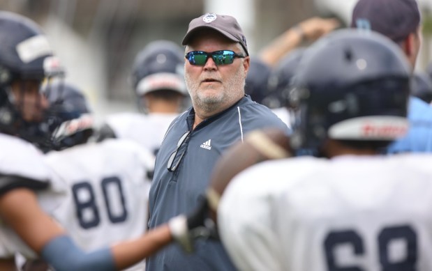 The Dieruff football team led by Coach Dave Lutte holds practice Monday, Aug, 10, 2026, on the opening day of the heat acclimatization period. The Huskies practice well away from the school on North 3rd Street in Allentown. (Monica Cabrera/The Morning Call)