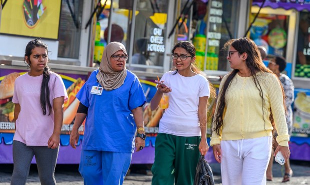 People enjoy the food, sights and sounds Thursday, Sept. 03, 2026, at the Allentown Fair, which continues through Monday. (April Gamiz/The Morning Call)