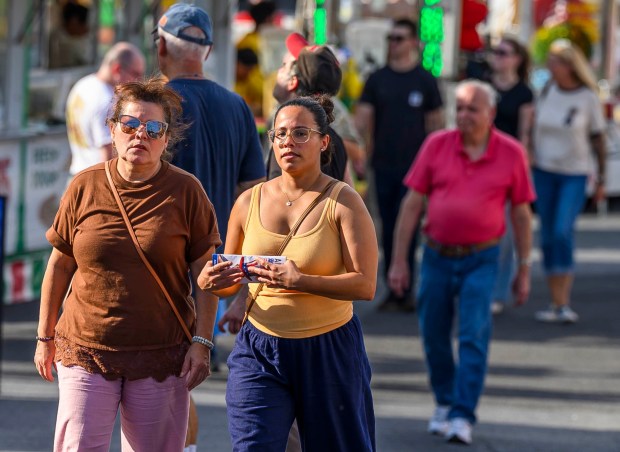 People enjoy the food, sights and sounds Thursday, Sept. 03, 2026, at the Allentown Fair, which continues through Monday. (April Gamiz/The Morning Call)