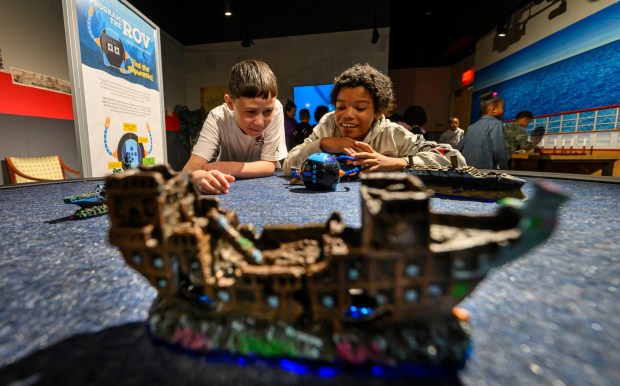 Allentown School District fifth graders Jocsan and Xavier play with miniature remotely operated vehicles in the "Finding Titanic: The Secret Mission" exhibit Tuesday, Sept. 29, 2026, at Da Vinci Science Center at PPL Pavilion. The  exhibit, which explores the story behind how the wreck of the RMS Titanic was found and the secret Cold War mission that made the historic discovery possible, runs through Jan. 19. (April Gamiz/The Morning Call)
