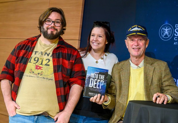 Robert Ballard, best known for his discovery of the RMS Titanic, meets Danielle and Ben Yenser on Tuesday, Sept. 29, 2026, after speaking to Allentown School District fifth graders and community members at Da Vinci Science Center at PPL Pavilion. The "Finding Titanic: The Secret Mission" exhibit, which explores the story behind how the wreck was found and the secret Cold War mission that made the historic discovery possible, runs through Jan. 19. (April Gamiz/The Morning Call)