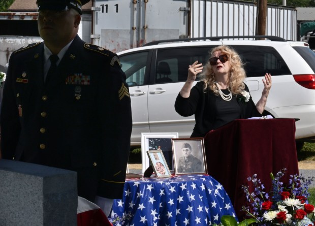 Joan Vannatta translates into sign language the funeral of her uncle, U.S. Army Private First Class Howard G. Krapf, on Monday, Sept. 21, 2026, at Fairview Cemetery in Whitehall. Krapf was killed in action during World War II but his remains were unidentified for 82 years. (Monica Cabrera/The Morning Call)