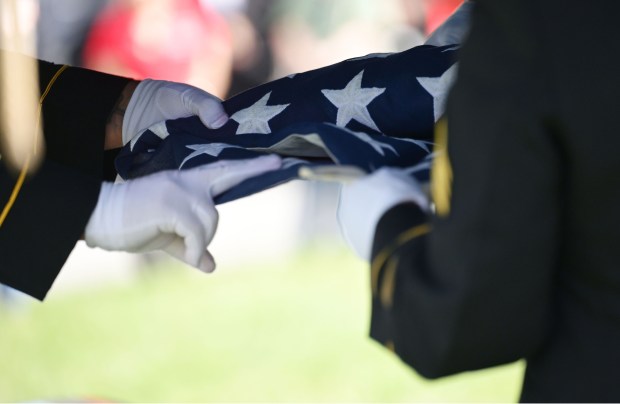 Veterans participate in a flag-folding and presentation ceremony at the funeral of US Army Private First Class Howard G. Krapf on Monday, Sept. 21, 2026, at Fairview Cemetery in Whitehall. Krapf was killed in action during World War II but his remains were unidentified for 82 years. (Monica Cabrera/The Morning Call)