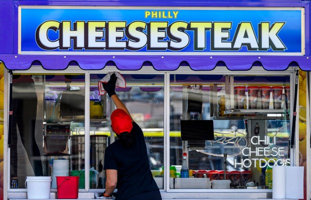 Tiffany Janice cleans her food truck that serves cheesesteaks, bacon burgers and other fair foods Tuesday, Sept. 1, 2026, at the Allentown Fairgrounds. The 174th Allentown Fair opens Wednesday and runs through Labor Day. (April Gamiz/The Morning Call)