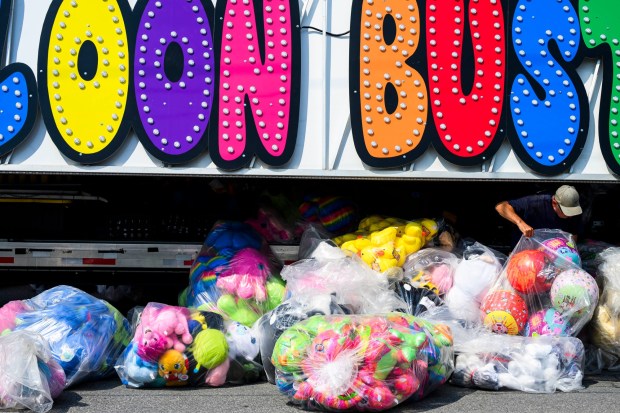 Workers prepare rides, games, and food areas the day before opening day of the Allentown Fair on Tuesday, Sept. 1, 2026, at the Allentown Fairgrounds. The 174th fair opens Wednesday and runs through Labor Day. (April Gamiz/The Morning Call)