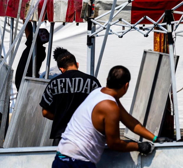 Workers prepare rides, games, and food areas the day before opening day of the Allentown Fair on Tuesday, Sept. 1, 2026, at the Allentown Fairgrounds. The 174th fair opens Wednesday and runs through Labor Day. (April Gamiz/The Morning Call)