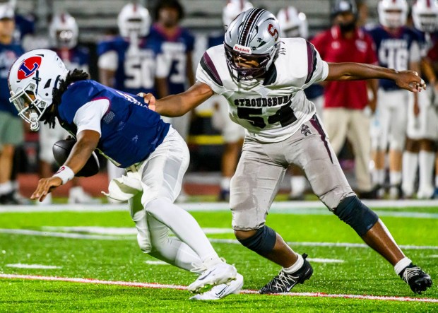 Liberty's quarterback Alsaiah Gross is stopped Thursday, Sept. 10, 2026, by Stroudsburg's Kevin Owusu-Ansah during a football game at BASD Stadium in Bethlehem.(April Gamiz/The Morning Call)