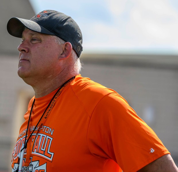 Northampton coach John Toman directs football players as they run drills Monday, Aug. 17, 2026, at Northampton Area High School. (April Gamiz/The Morning Call)