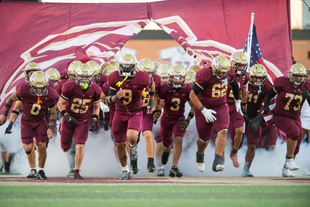 Whitehall's football team runs onto the field before taking on Northampton on Friday, Sept. 11, 2026, for the annual Cement Bowl rivalry game at Whitehall. (Jonathan Broady/Special to The Morning Call)