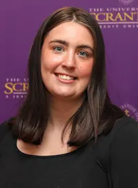 A headshot of an individual.
