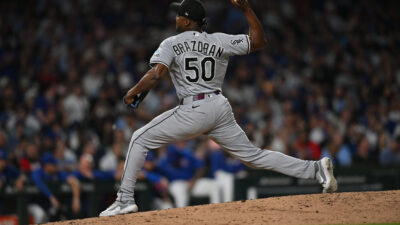 Aug 18, 2026; Chicago, Illinois, USA; Chicago White Sox pitcher Huascar Brazobán (50) pitches against the Chicago Cubs during the sixth inning at Wrigley Field.