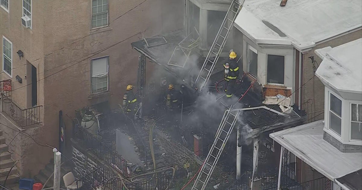 Woman killed, another person hurt after fire spreads to 2 homes in Roxborough section of Philadelphia