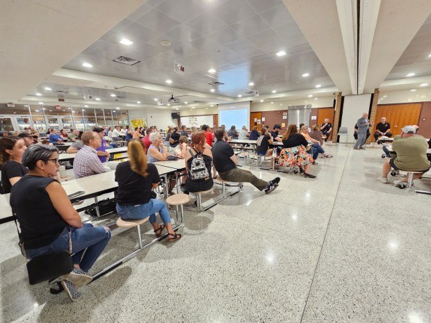 Hundreds packed the Gov. Mifflin Intermediate School cafeteria Thursday night as school district and law enforcement officials sought to separate fact from rumor following two recent security incidents on school property. (Michelle Lynch/Reading Eagle)
