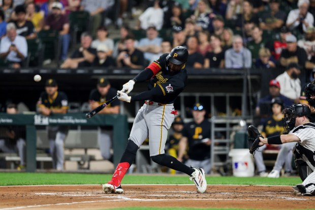 Pirates center fielder Oneil Cruz hits a solo home run in the fourth inning against the White Sox on Sept. 10, 2026, at Rate Field. (Armando L. Sanchez/Chicago Tribune)