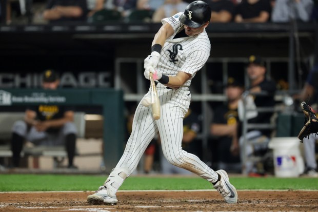 Colson Montgomery hits a double in the seventh inning for the first White Sox hit of the game against the Pirates on Sept. 10, 2026, at Rate Field. (Armando L. Sanchez/Chicago Tribune)