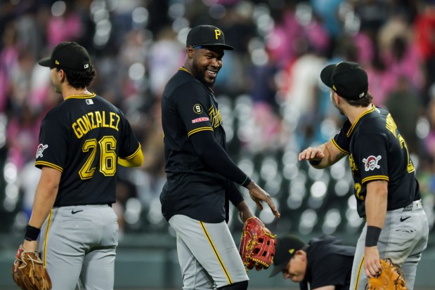 Oneil Cruz, center, celebrates with teammates after the Pirates defeated the White Sox 2-0 on Sept. 10, 2026, at Rate Field. (Armando L. Sanchez/Chicago Tribune)