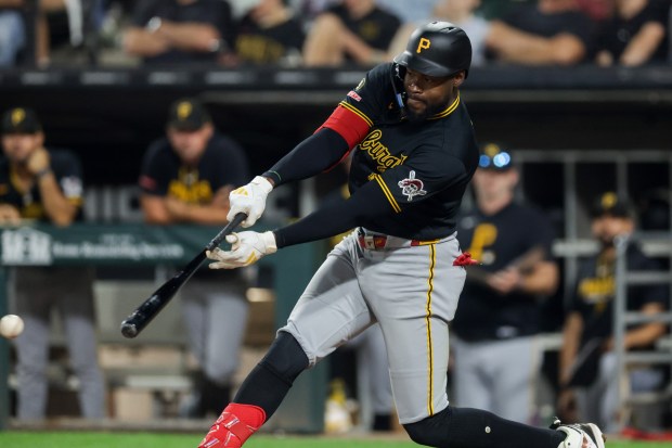 Pirates center fielder Oneil Cruz hits an RBI single in the eighth inning against the White Sox on Sept. 10, 2026, at Rate Field. (Armando L. Sanchez/Chicago Tribune)