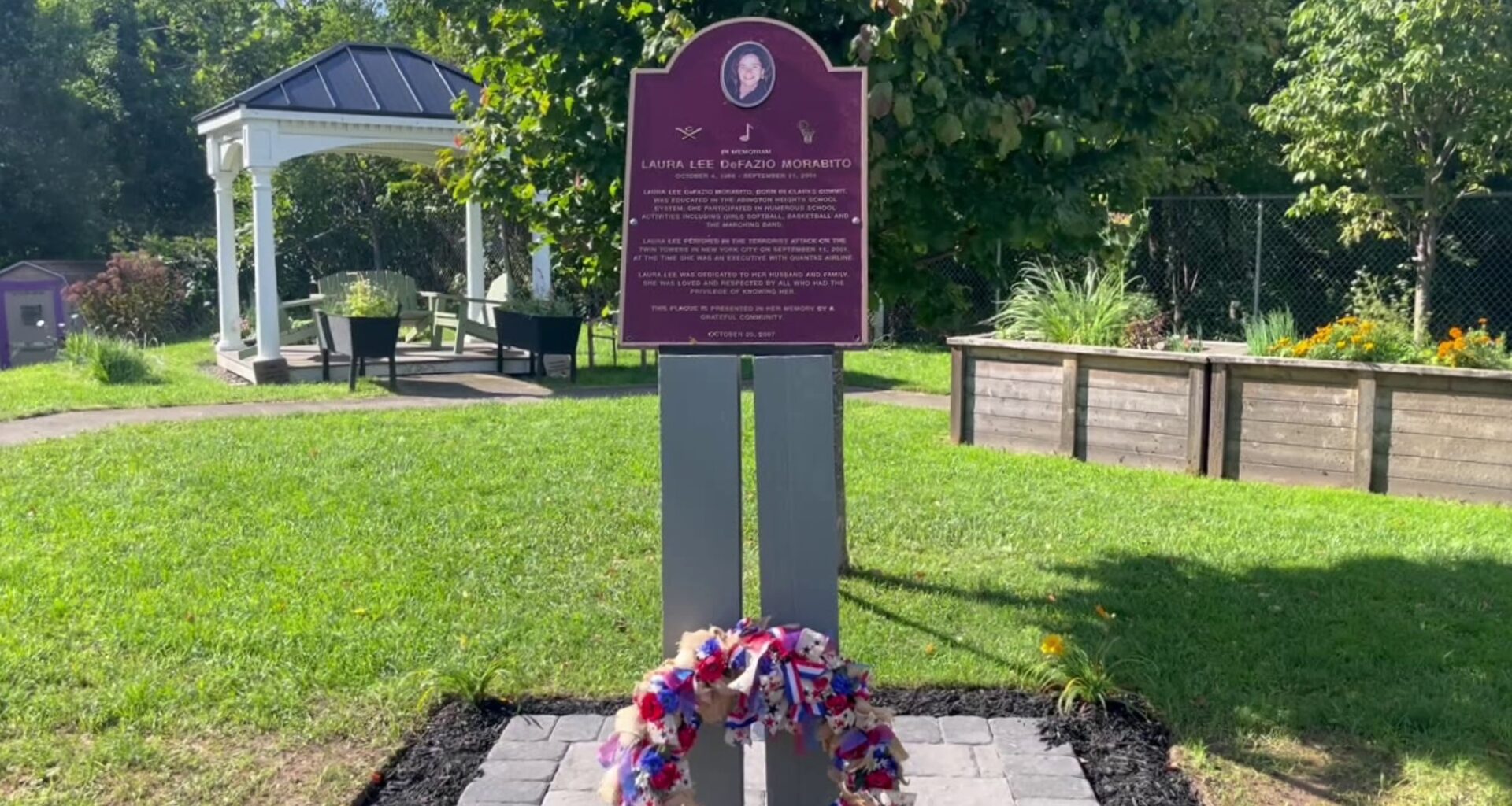 Memorial honoring local woman lost in 9/11 attacks rededicated in new location