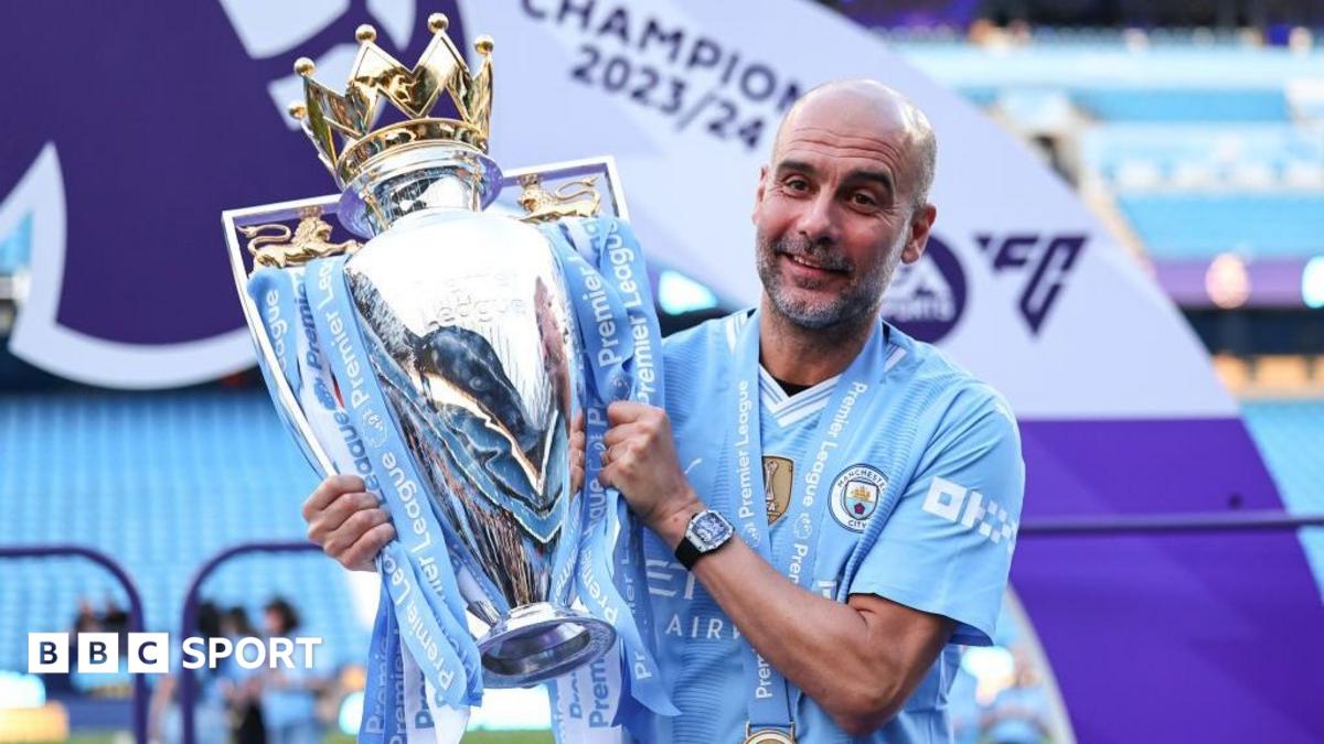 Manchester City manager Pep Guardiola lifting the 2023-24 Premier League title