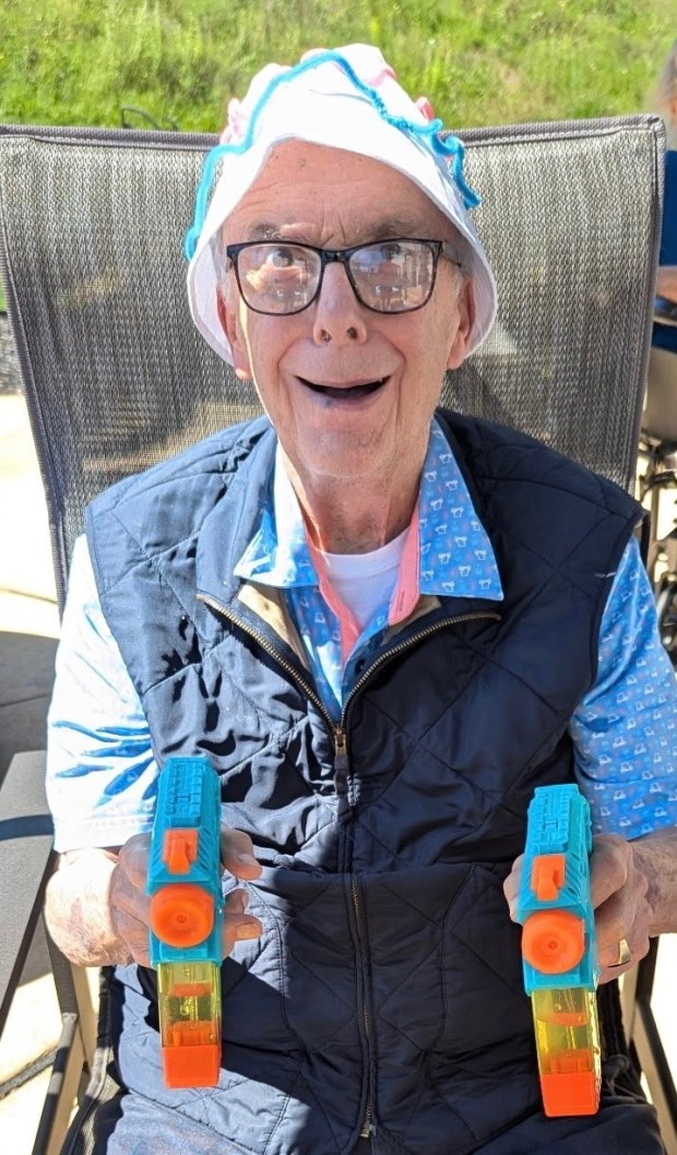 Resident Thomas "Tom" Heck was ready for battle at the Care Center's annual Splash Day Party. (Courtesy of The Heritage of Green Hills)