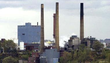 Hammermill smokestacks are crumbling. Two of them are coming down