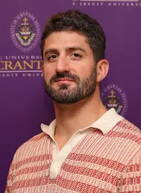 A headshot of an individual.